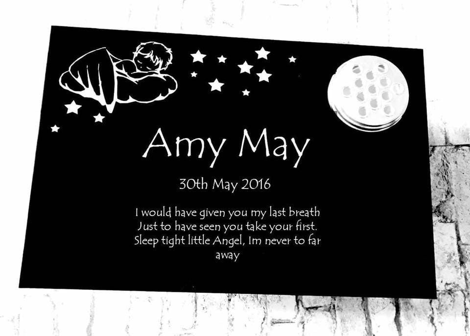 'Baby in clouds' Grave marker with flower pot