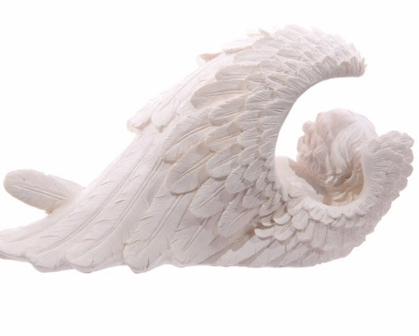 Angel cherub sleeping in wings