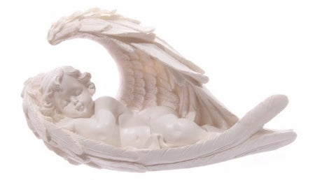 Angel cherub sleeping in wings