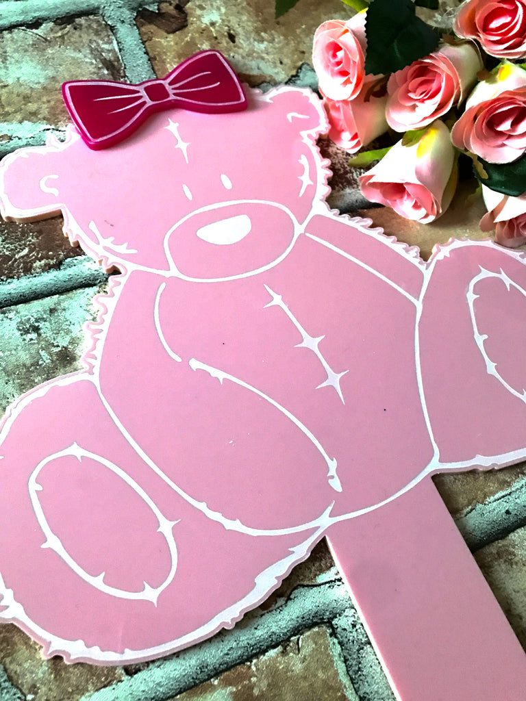 Pink teddy with bow
