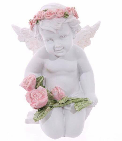 Cherub holding roses